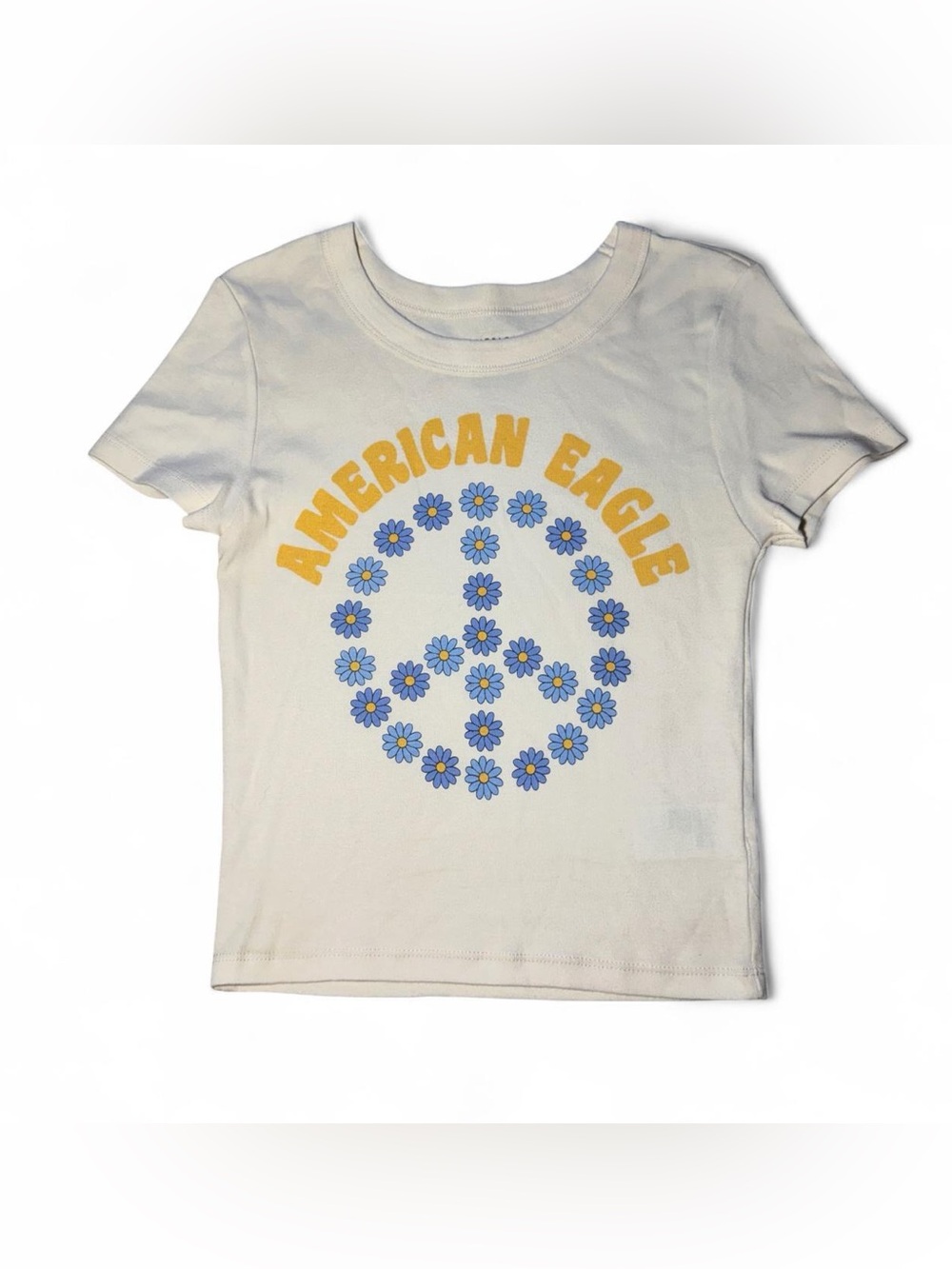 Groovy Bohemian American Eagle cream baby tee with blue daisies in peace sign 🫧